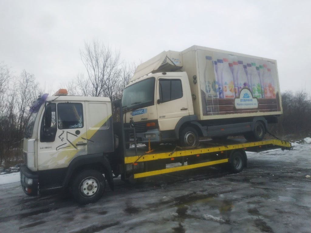 Услуги эвакуатора. Доставка авто из Европы в Украину, попутный эвакуатор, услуги автовоза. Транспортная компания Evak-Expert.