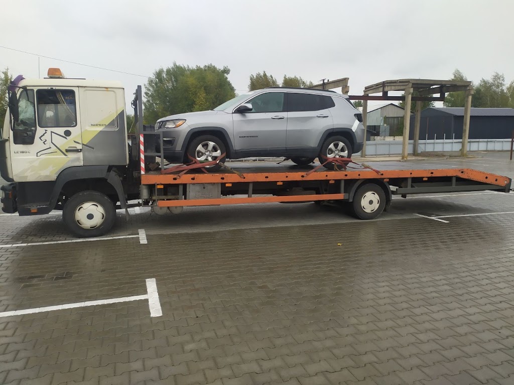 Услуги эвакуатора. Доставка авто из Европы в Украину, попутный эвакуатор, услуги автовоза. Транспортная компания Evak-Expert.